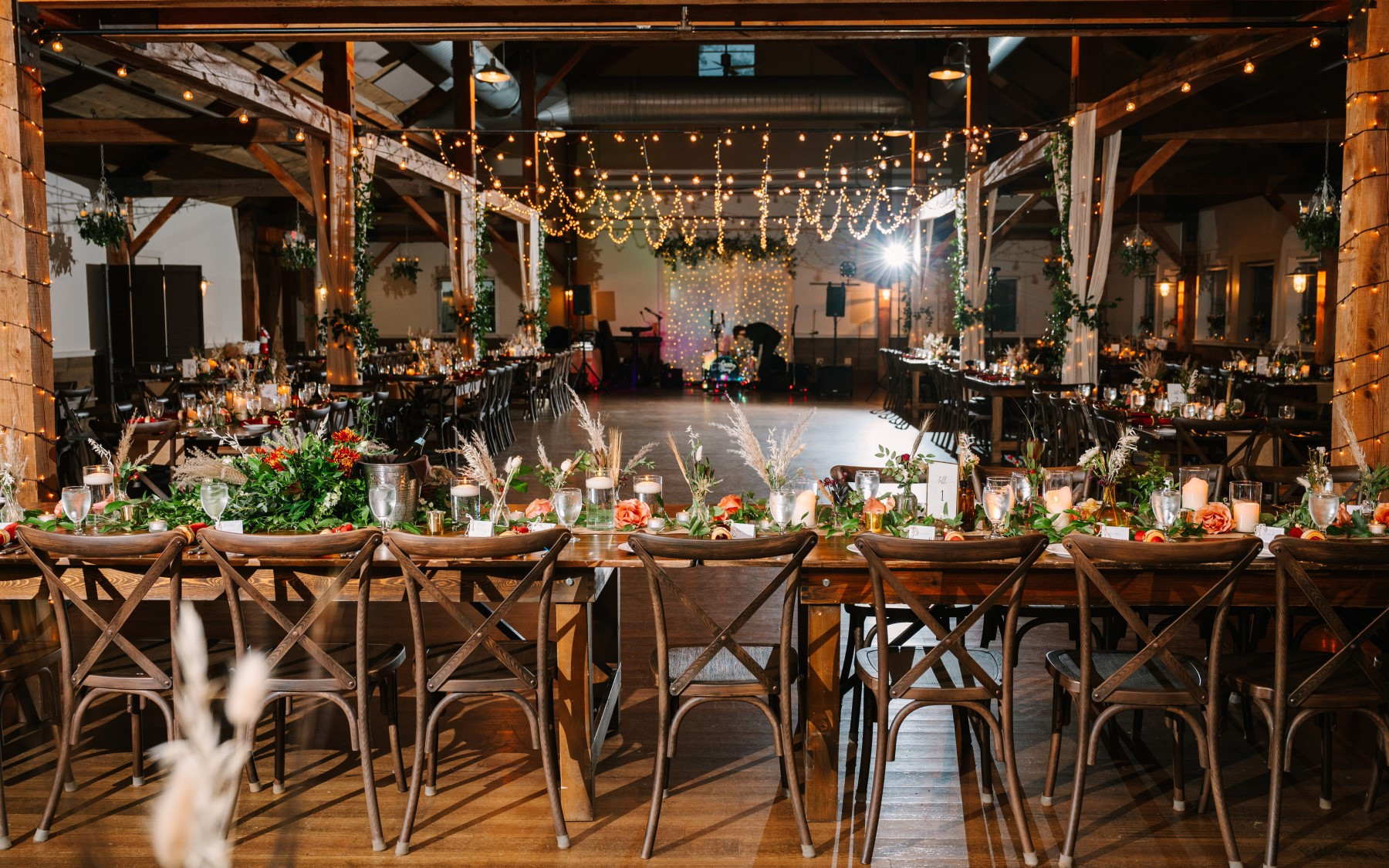 event barn set up for a fall wedding showcasing the dance floor.
