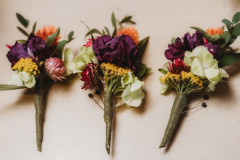 close up of boutonierres for a fall wedding.