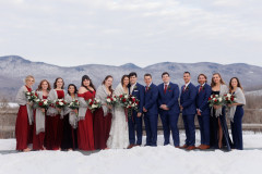 bridal party featuring 6 bridesmaids and 6 grooms-party members.