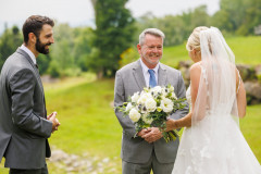 bride with father and brother during first look