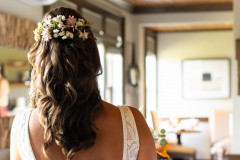 wedding hair on bride done with hair florals.